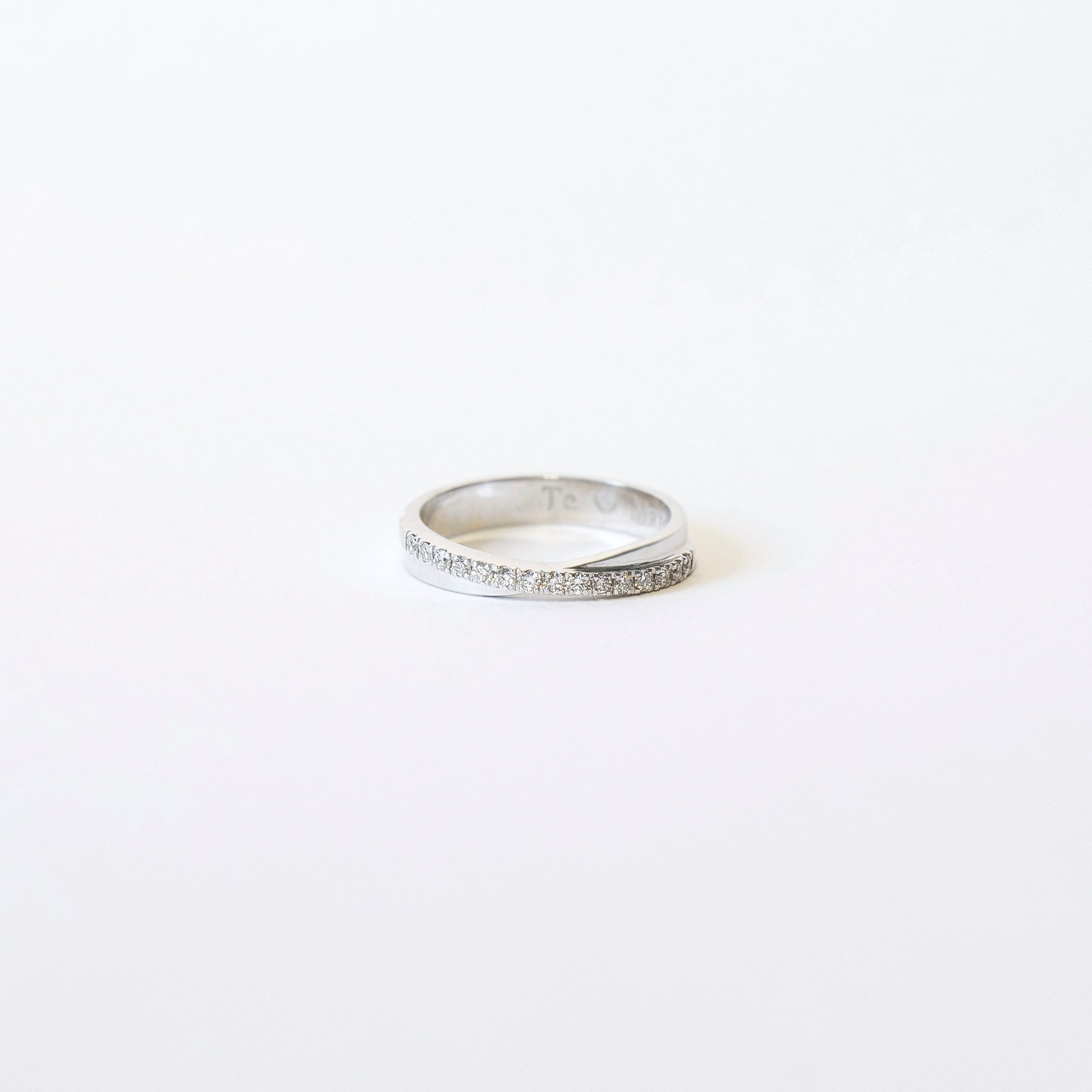 Crossed diamond band in 14k white gold