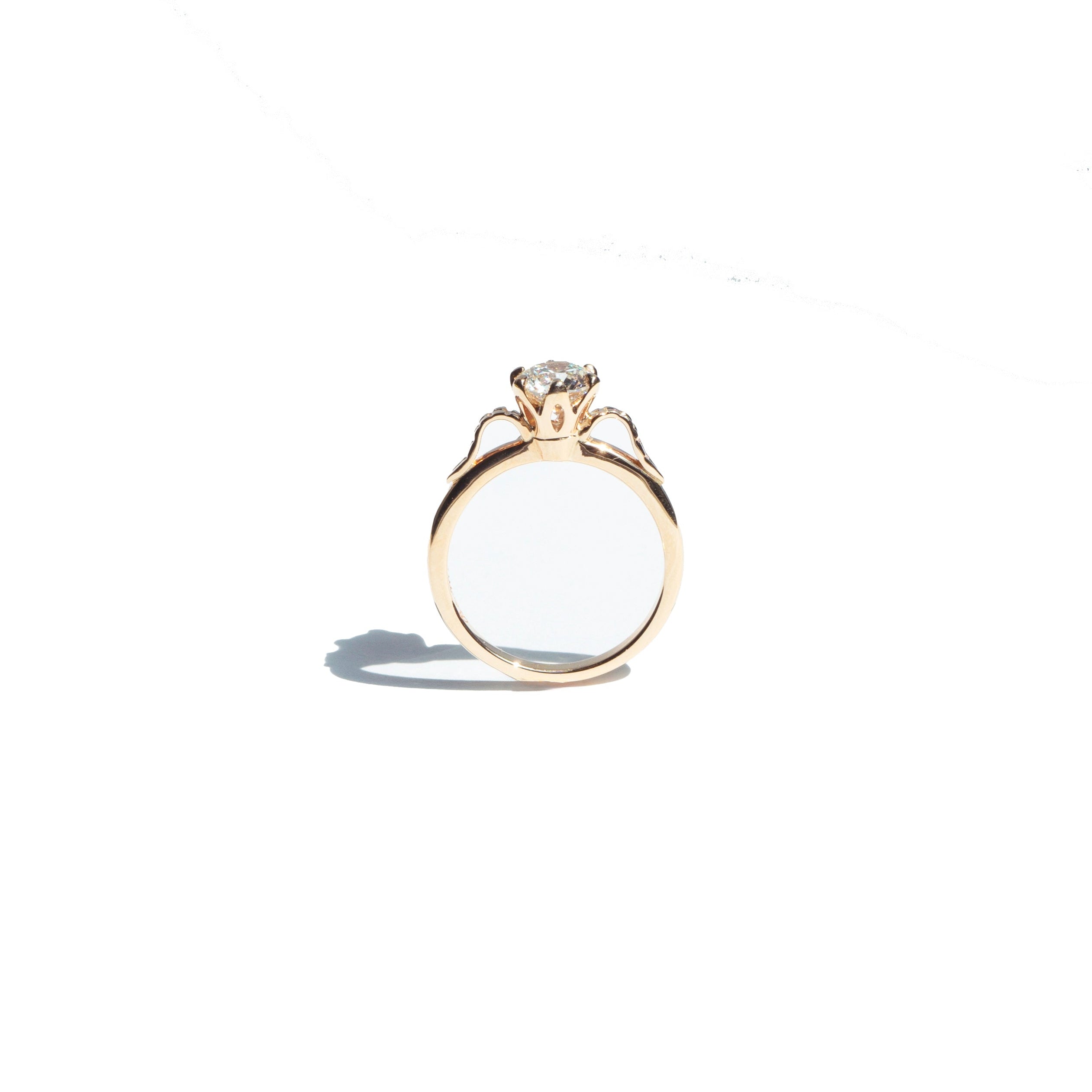 Floral six-prong round diamond ring in 14k yellow gold