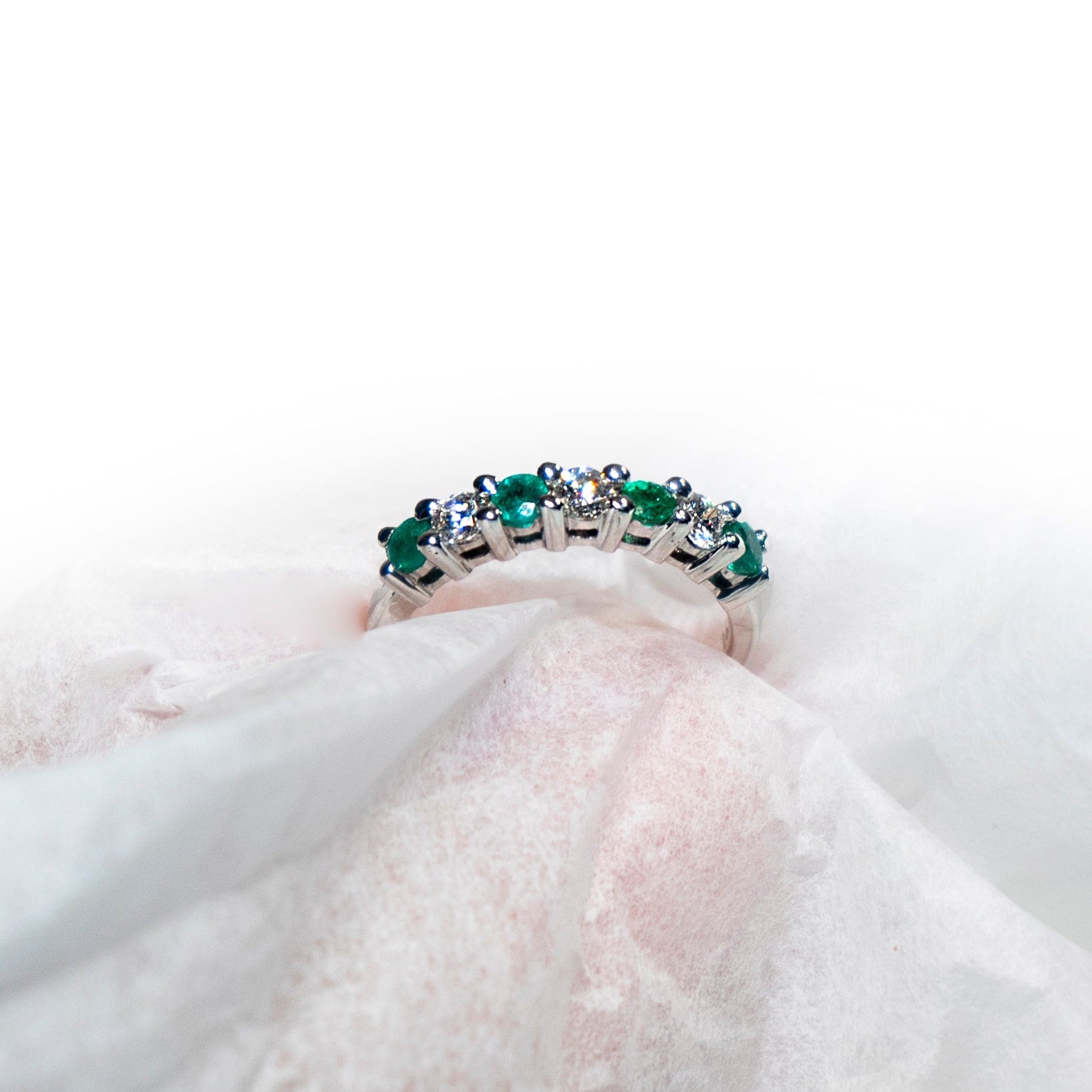 Classic emerald and diamond band