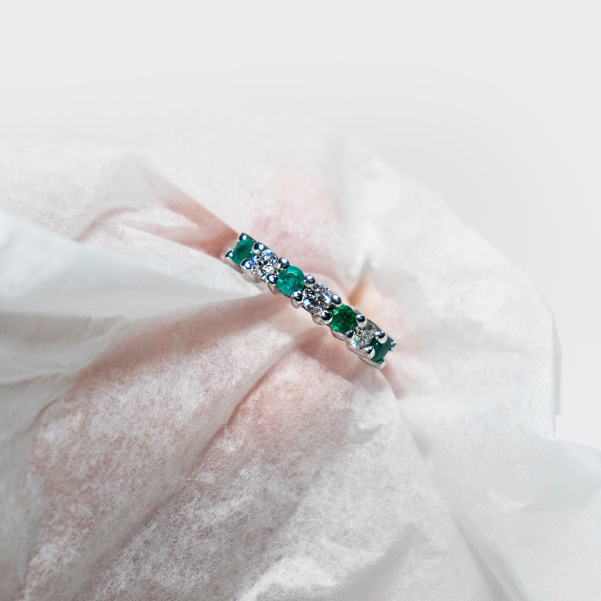 Classic emerald and diamond band