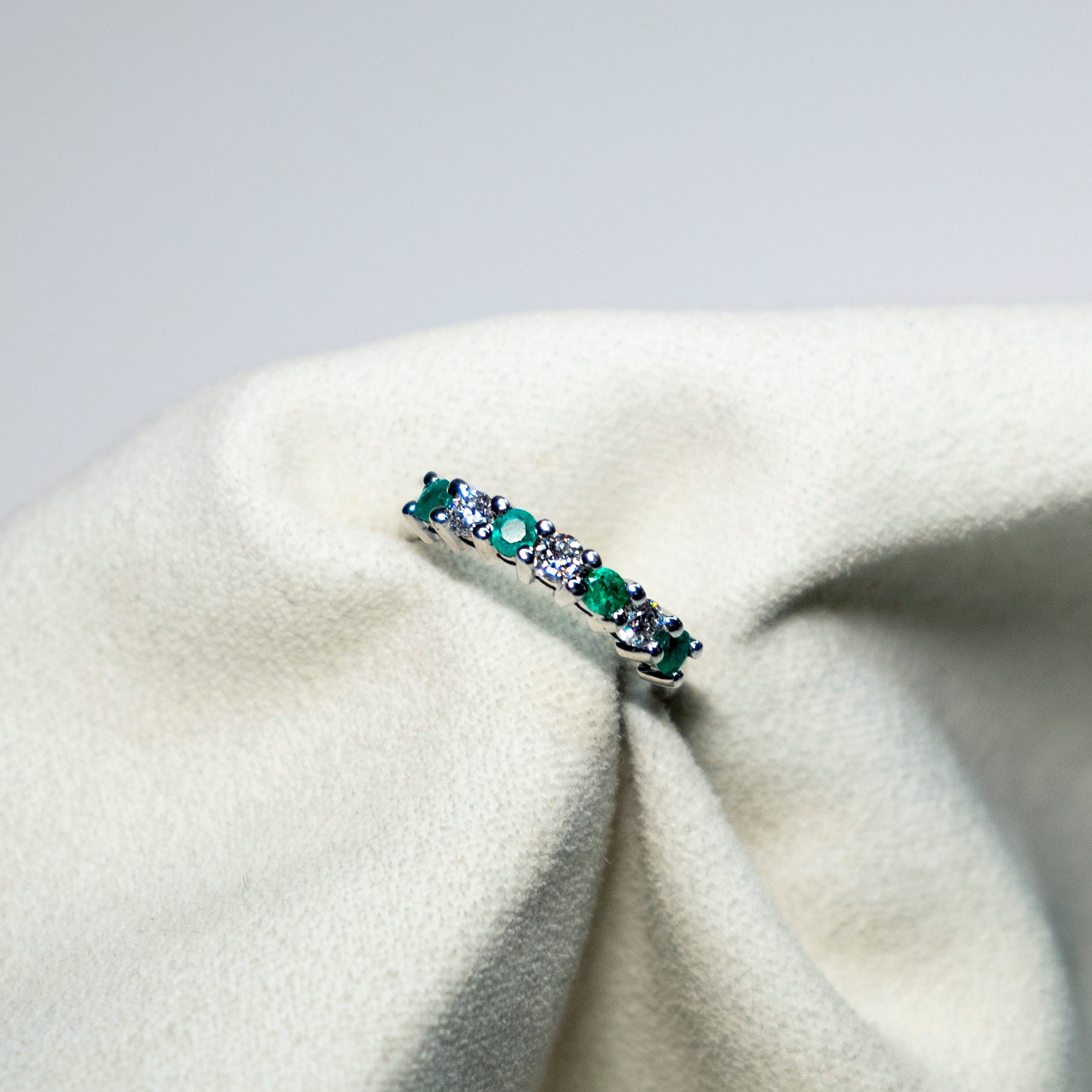 Classic emerald and diamond band