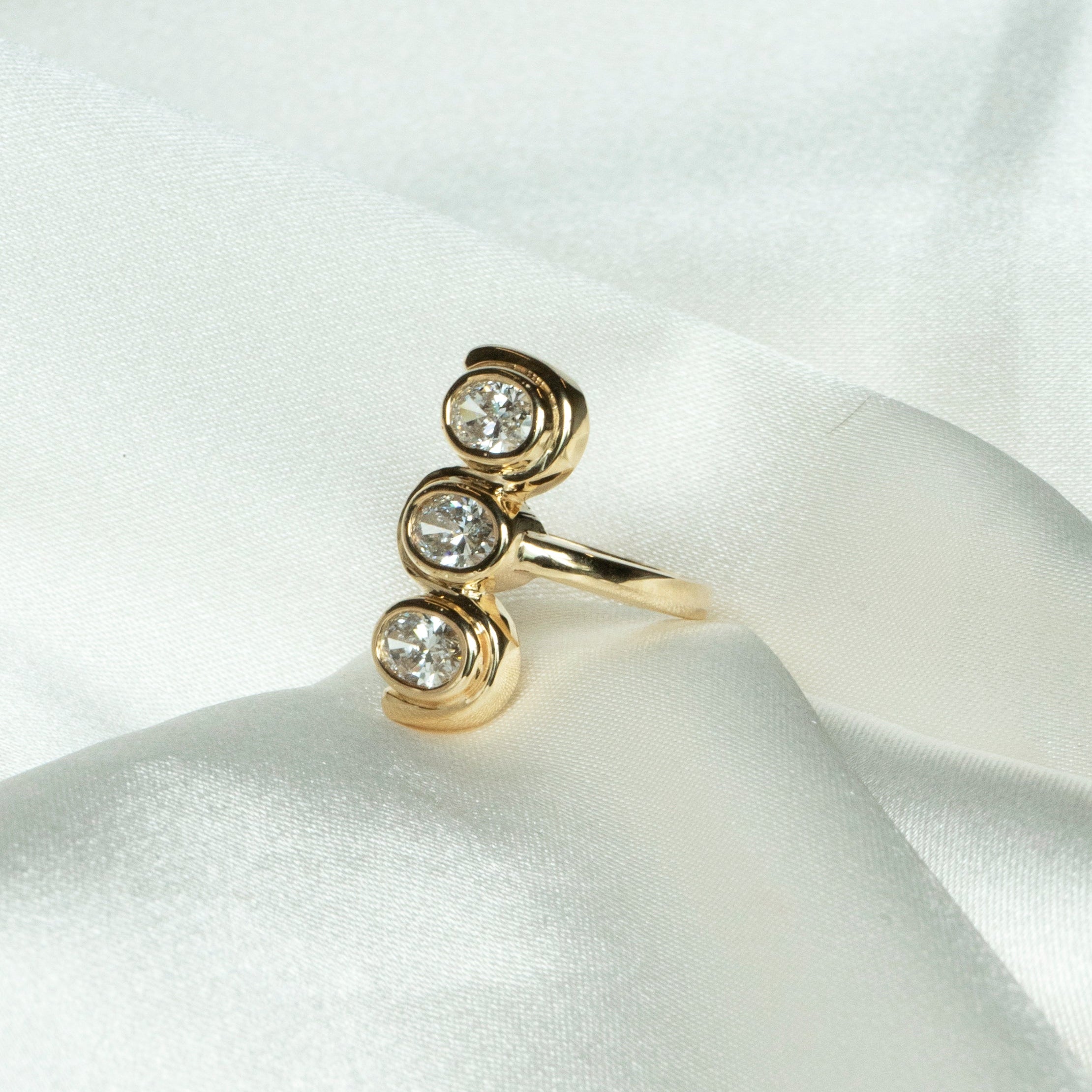 Three Diamond Bezel Ring