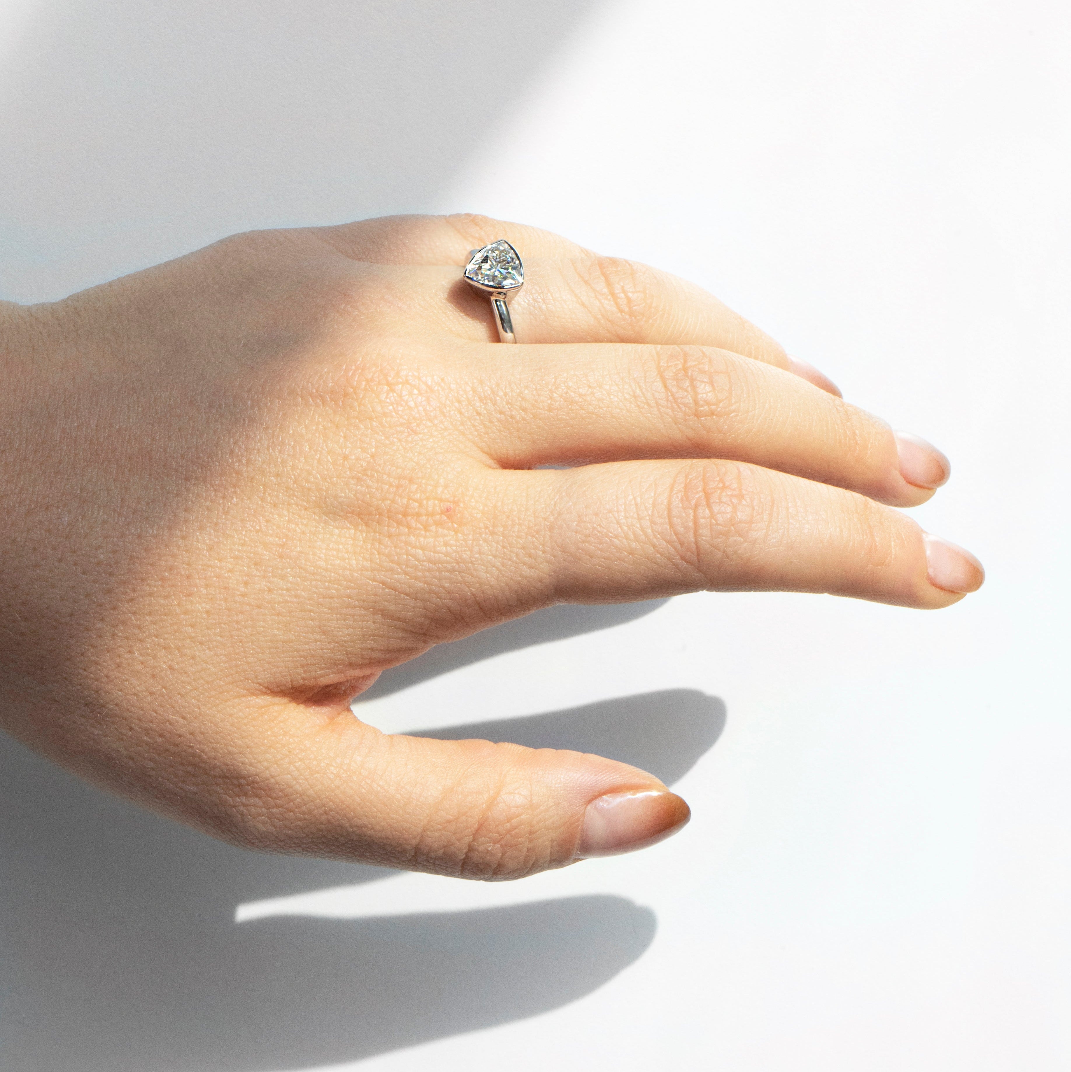 Trillion-cut moissanite bezel ring