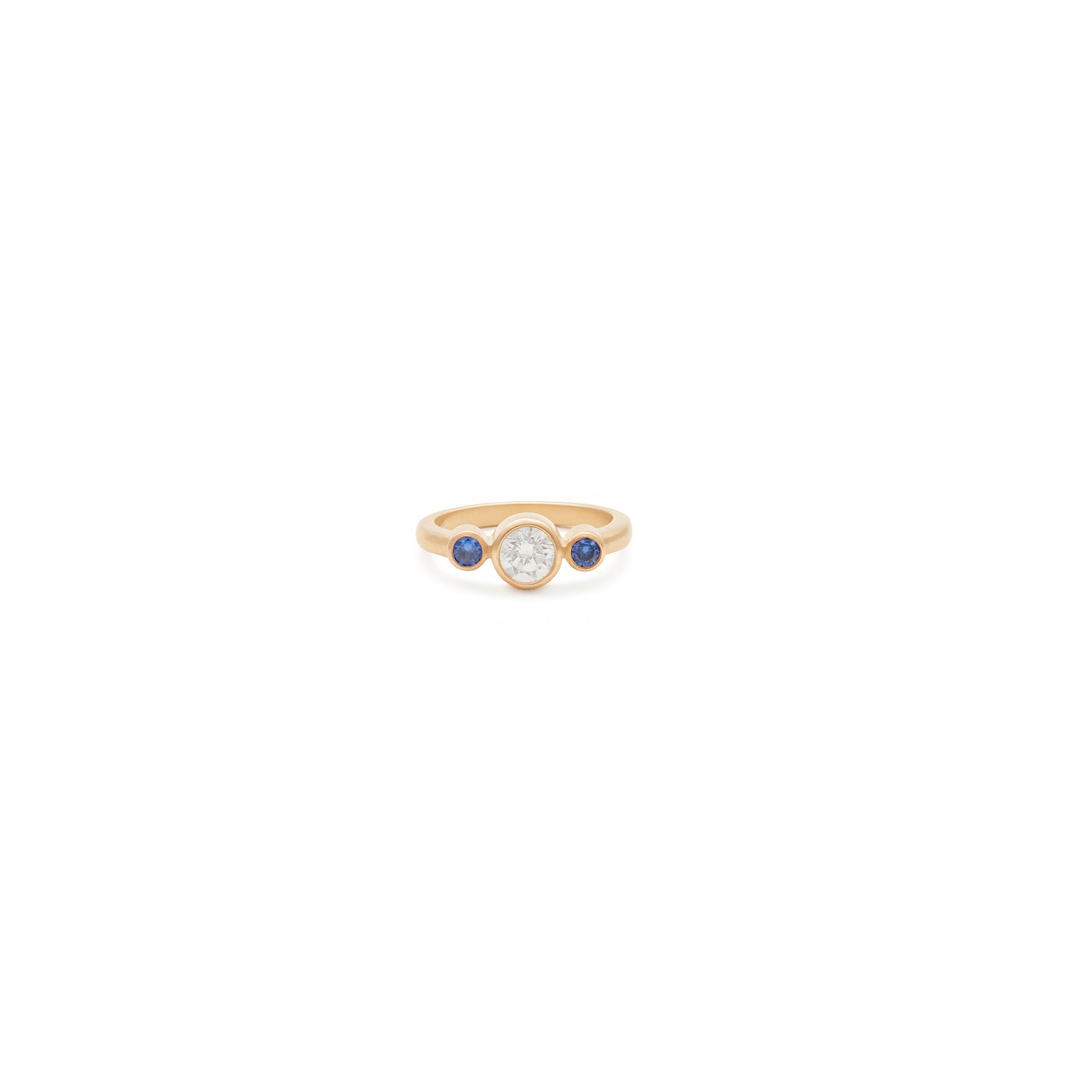 Bezel-set diamond and sapphire engagement ring