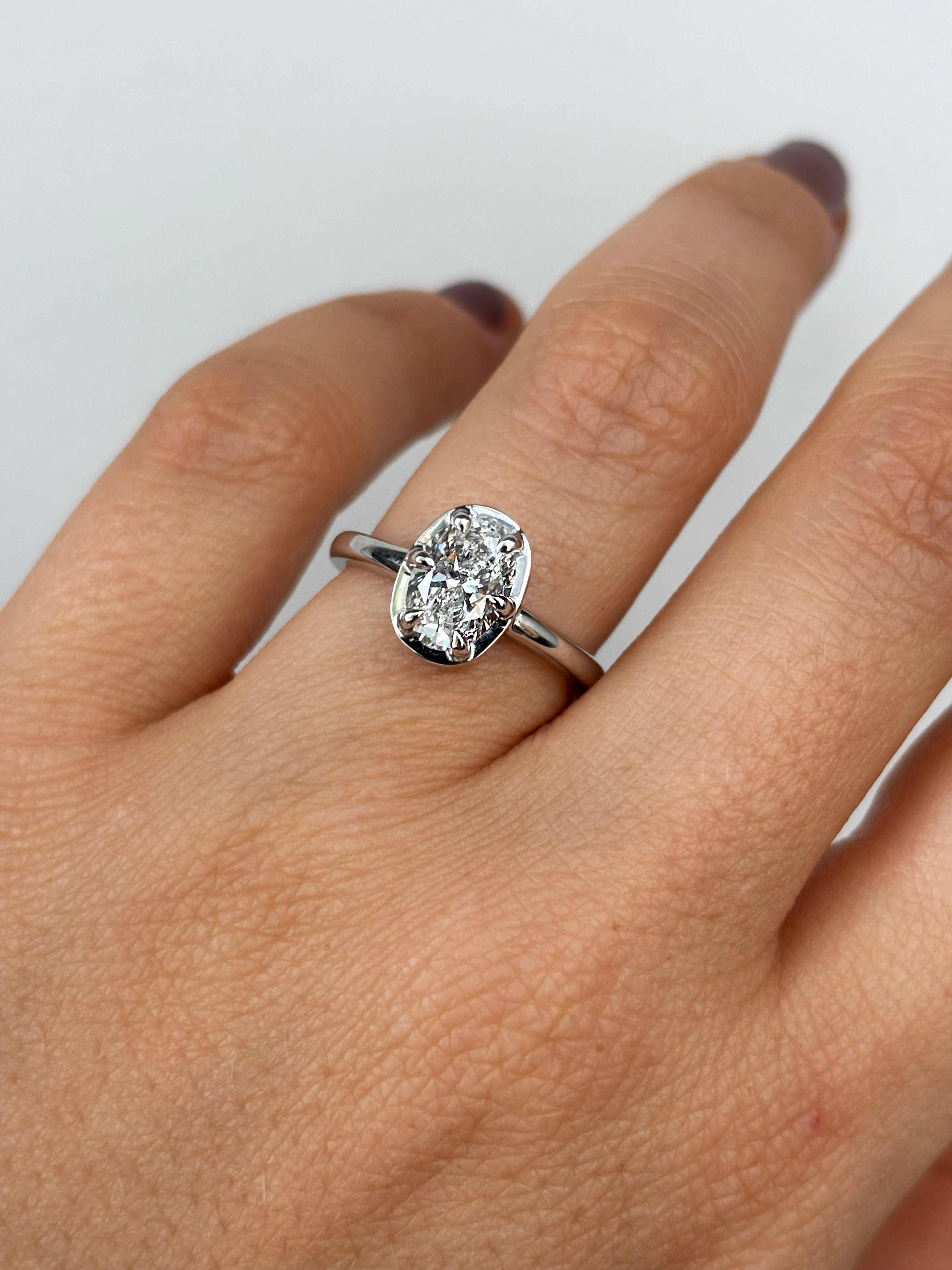 14k white gold oval lab-grown diamond ring with six-prong half-bezel