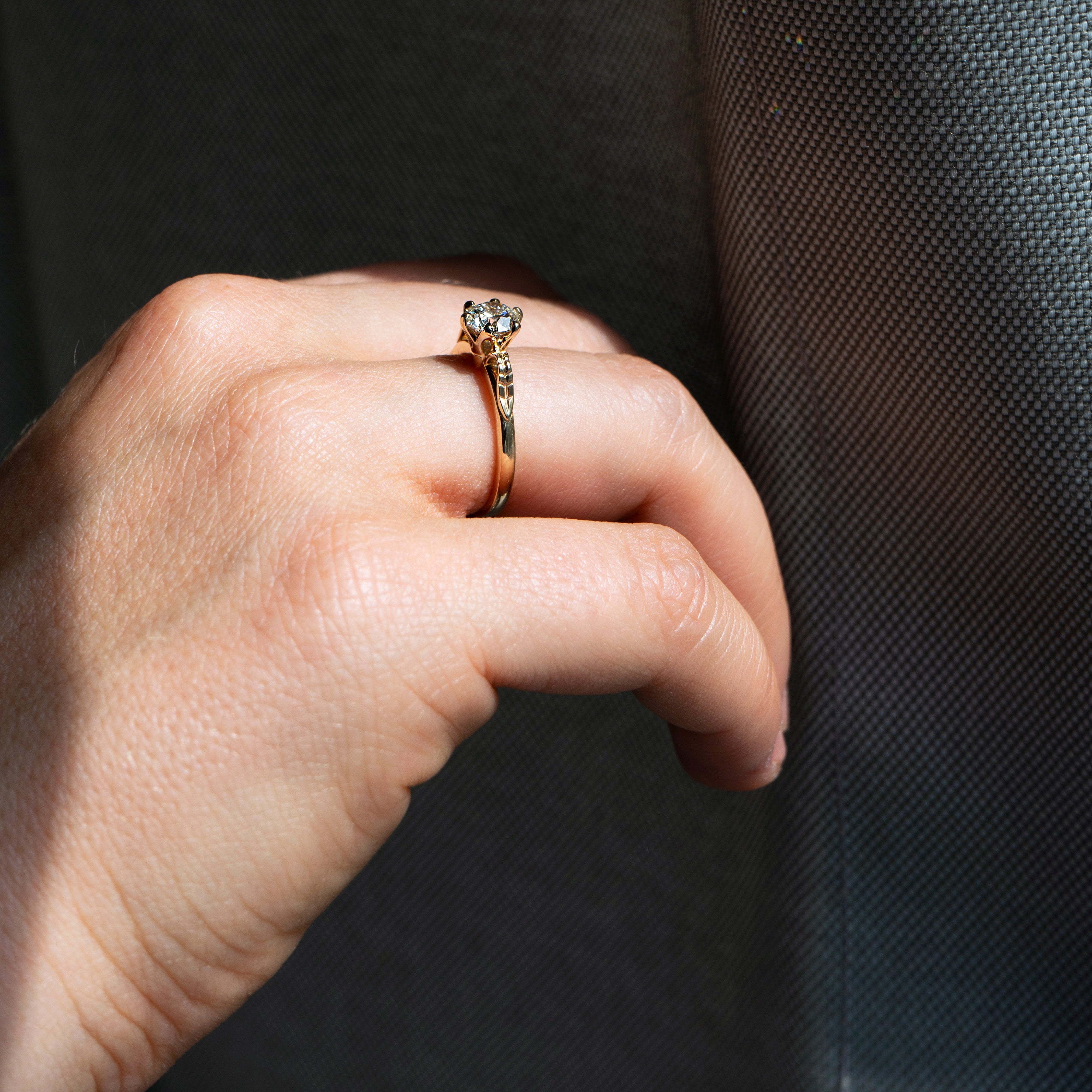 Floral six-prong round diamond ring in 14k yellow gold