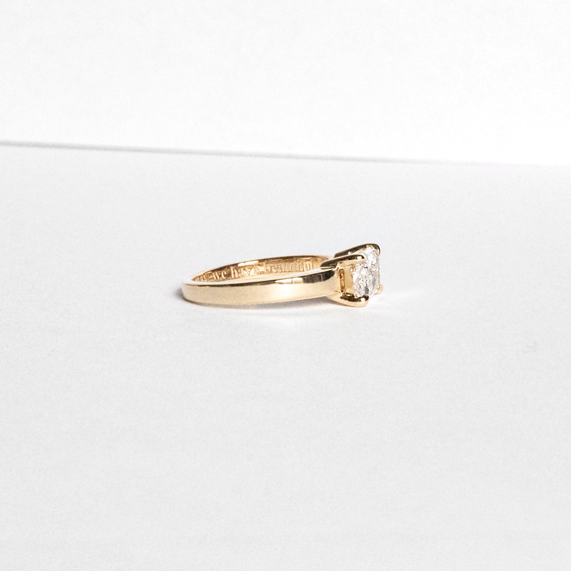 Radiant-cut lab-grown diamond engagement ring set east-west