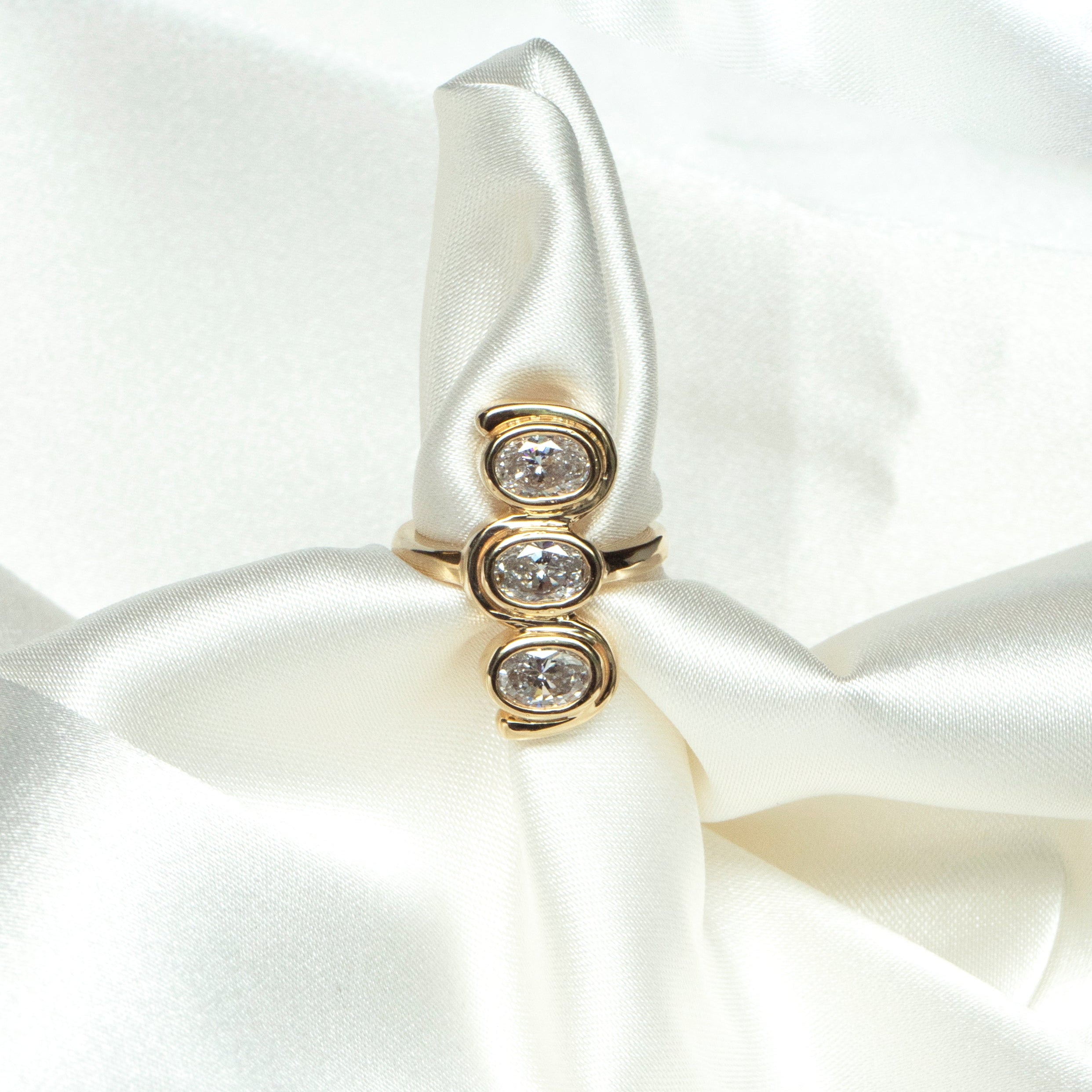 Three Diamond Bezel Ring