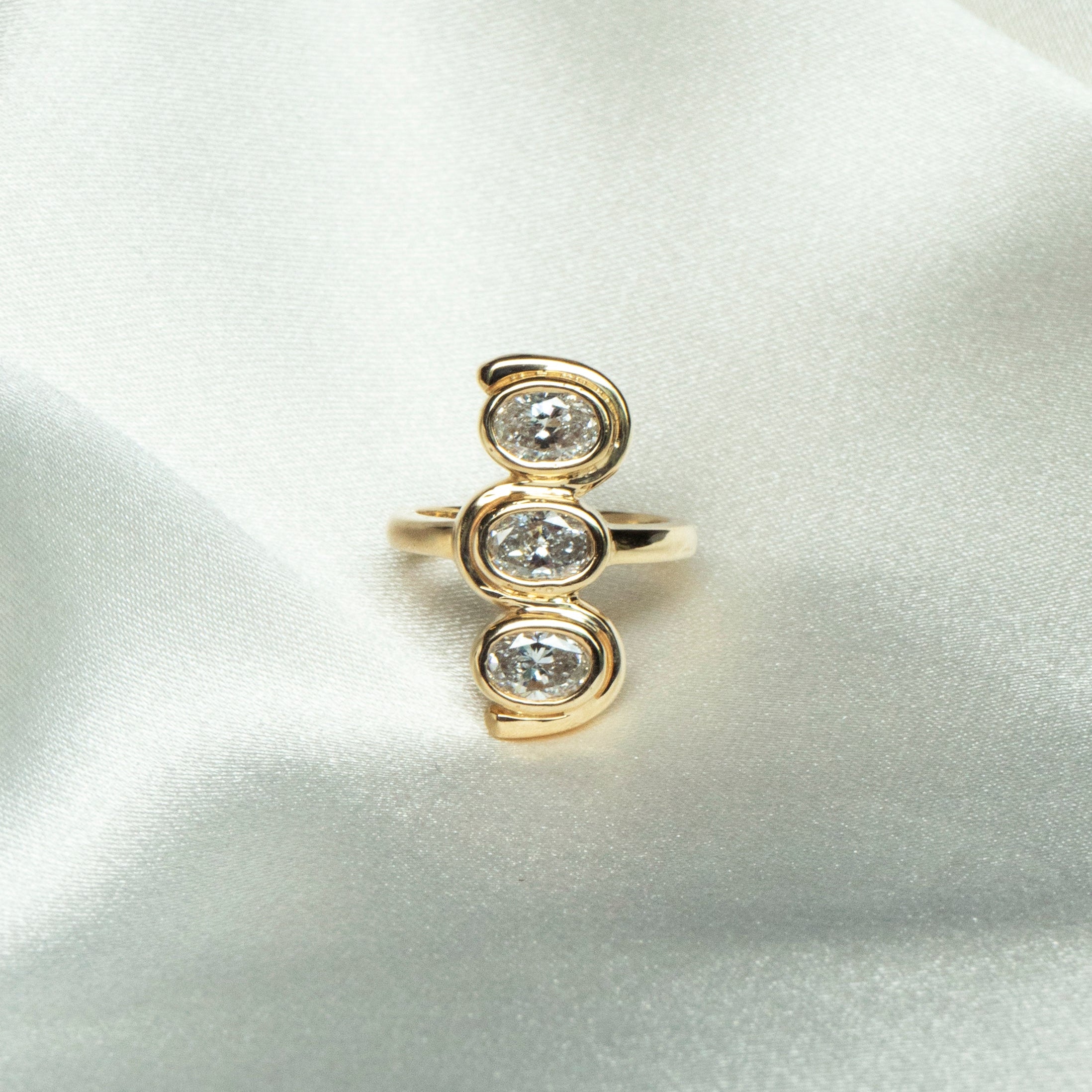 Three Diamond Bezel Ring