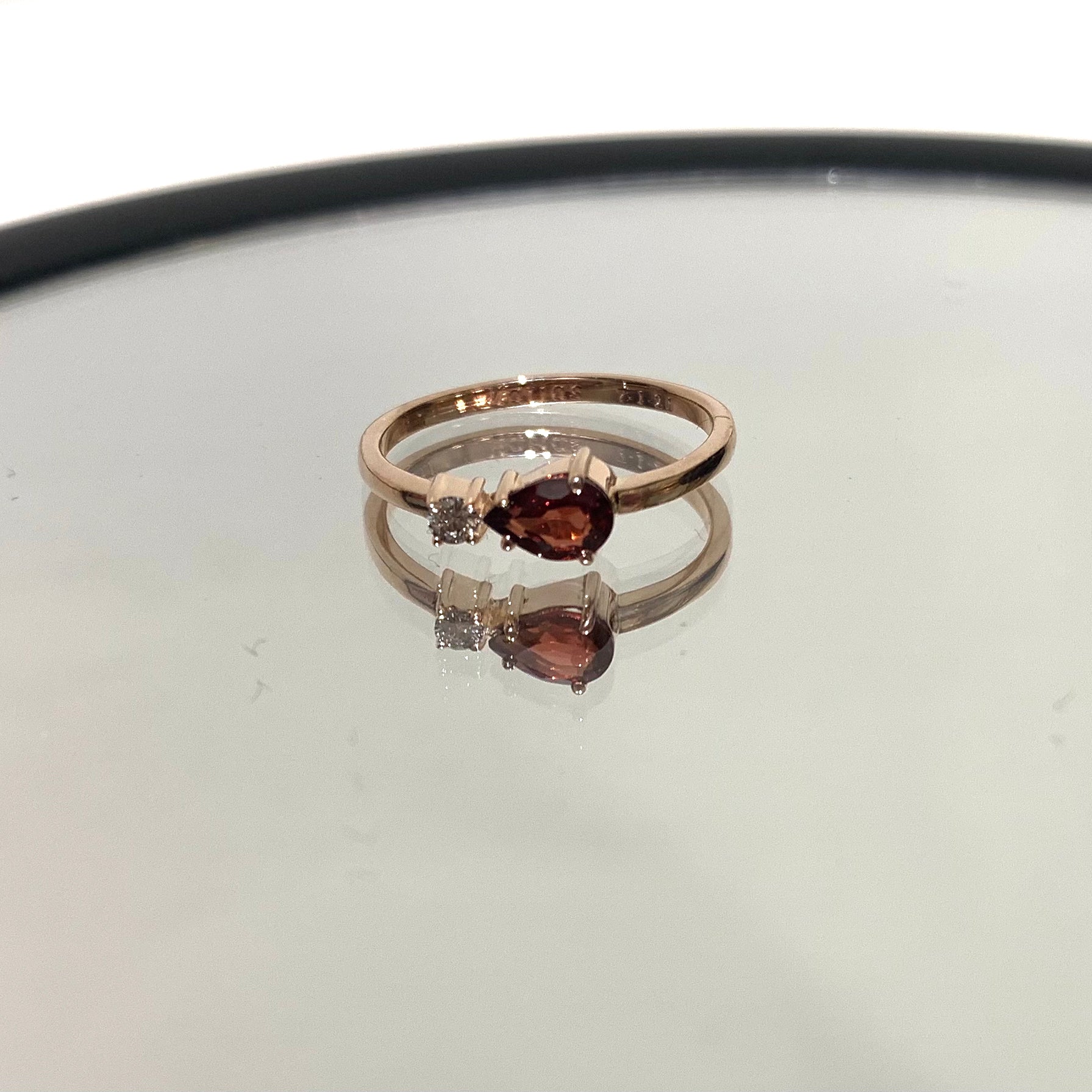 Garnet and diamond ring