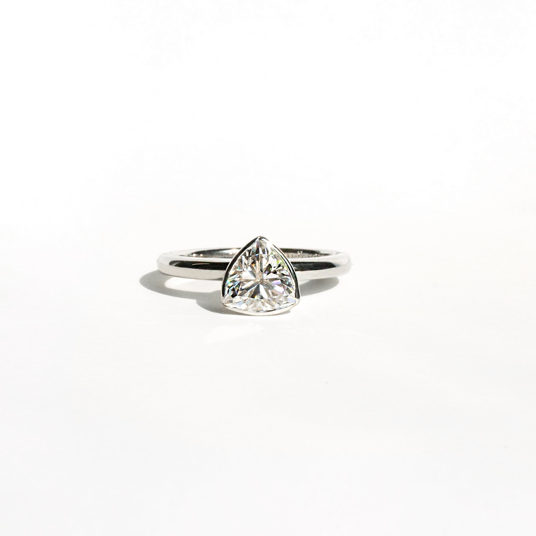 Trillion-cut moissanite bezel ring