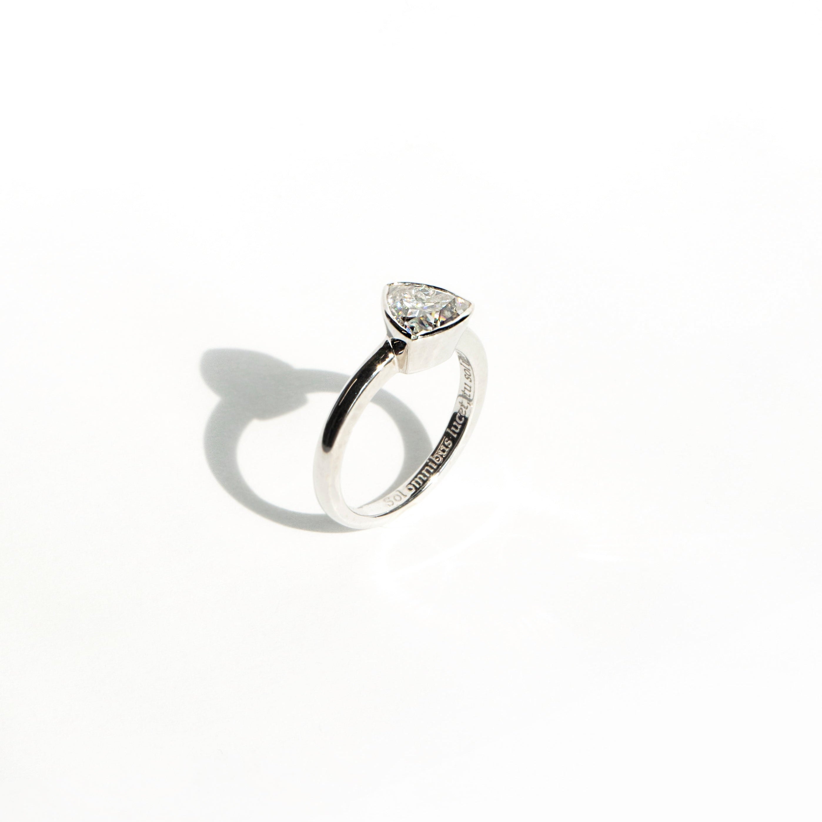 Trillion-cut moissanite bezel ring